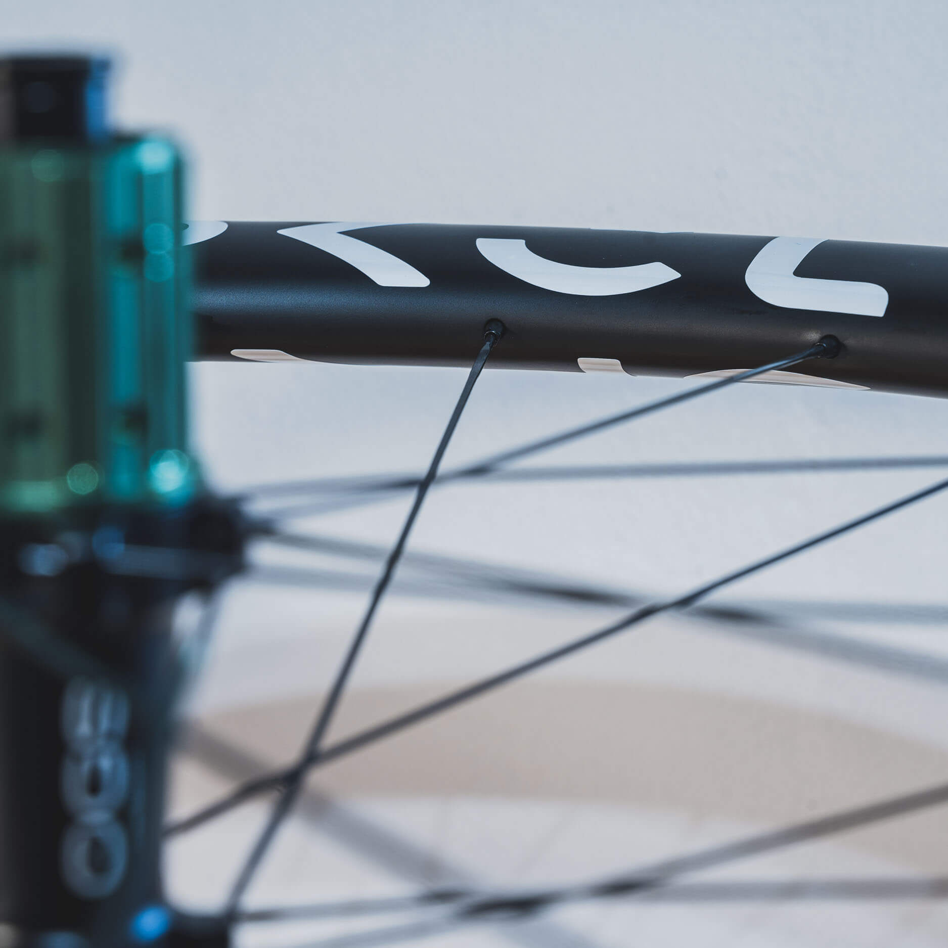 Asymmetric rim design spoke tension effect